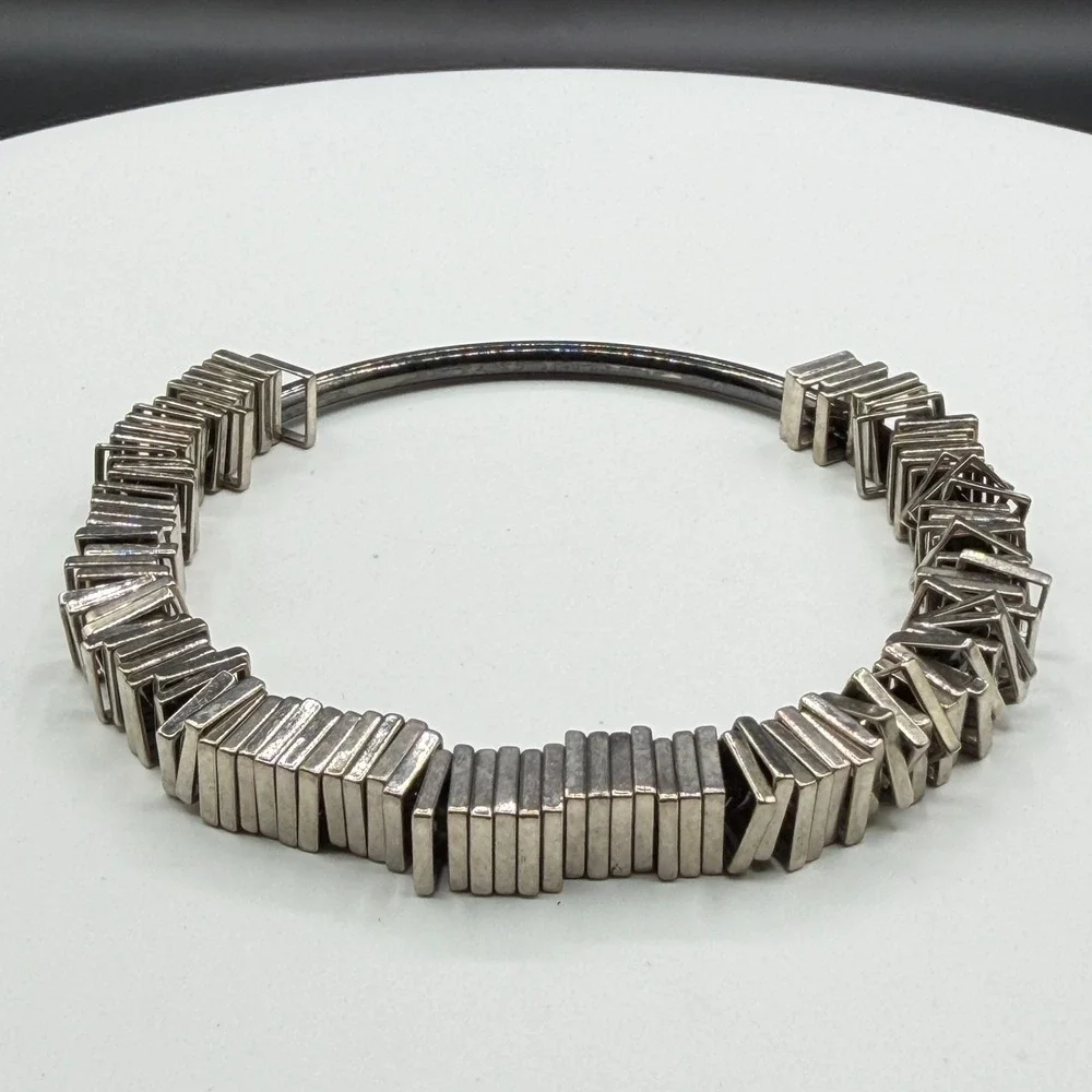 N/A sculptural silver